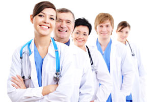 Employees interacting at a table during a meeting